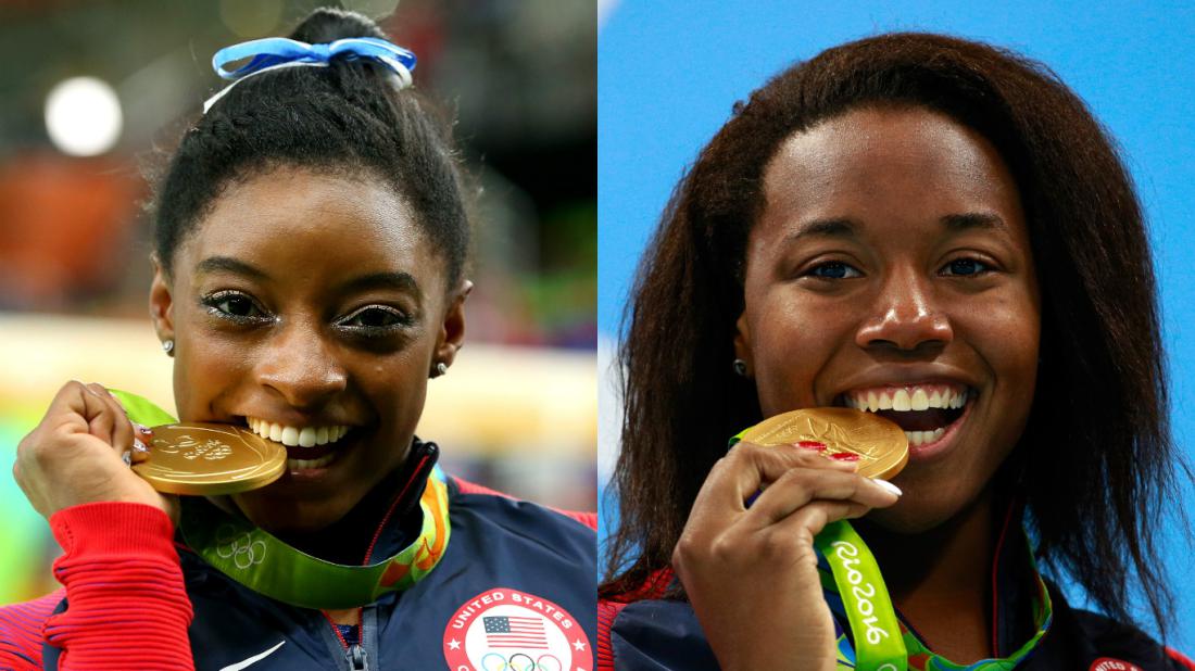 U.S. Olympians Simone Biles and Simone Manuel clinching their gold medals during the 2016 Olympics. (Courtesy photo)