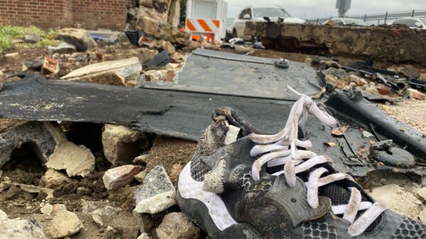 A lone shoe sits in the rubble and debris of a car accident on Howard University's campus on April 11.